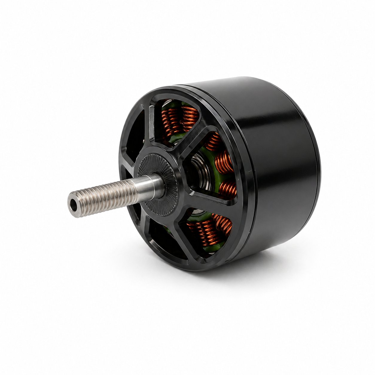Black drone motor with exposed copper windings and threaded shaft